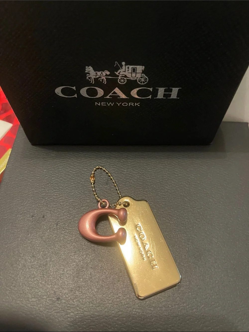 Coach Gold Tag Keychain with Rose Accent
